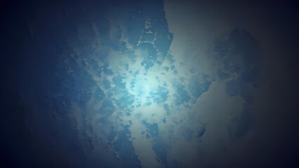 A mesmerizing abstract image featuring a blend of light blue and dark blue hues, creating a dreamy, ethereal atmosphere.