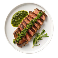 Sliced steak with chimichurri isolated on transparent background