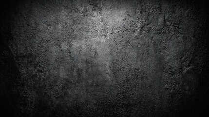 Obraz premium Dark, textured stone surface with mottled gray patterns and vignetting, resembling a weathered concrete wall, highlighting ruggedness