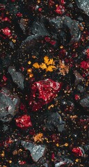Close-up view of dark rocks and gems.