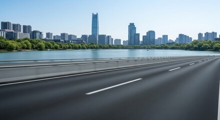 Fototapeta premium Urban highway over a serene lake, modern cityscape in the background