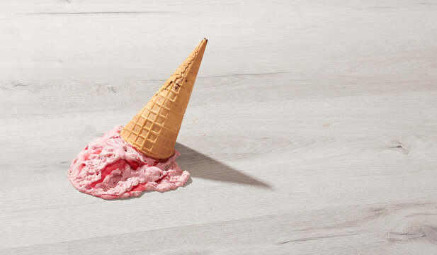 Ice cream in a waffle cone fell on floor