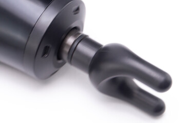 Close-up of a Black Massage Gun Head Attachment on White Background, Showing the Fork-Shaped Applicator.