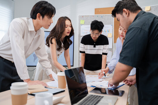 Group of creative Businesspeople brain storm meeting presentation,discussing roadmap to product launch, planning,strategy,dashboard,new business development,working with new startup project in office