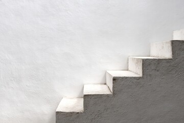 White stairs against a white wall