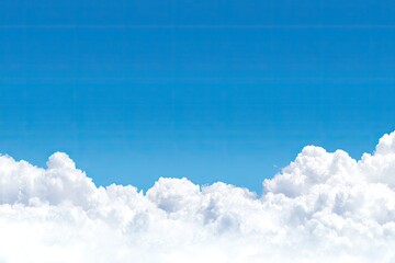 Vast, clear blue sky meets fluffy white clouds