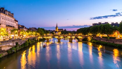 Obraz premium European city at twilight, river and bridge