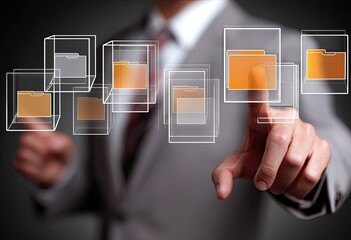 Businessperson interacts with digital file folders displayed in a holographic interface