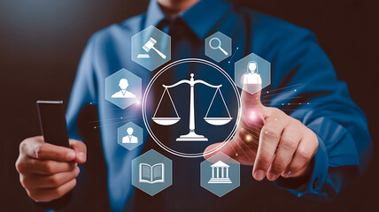 Lawyer interacts with digital interface displaying justice scales and legal icons symbolizing law and order in modern legal technology concept