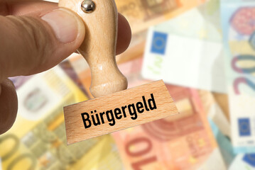 Euro Geldscheine und Stempel Bürgergeld