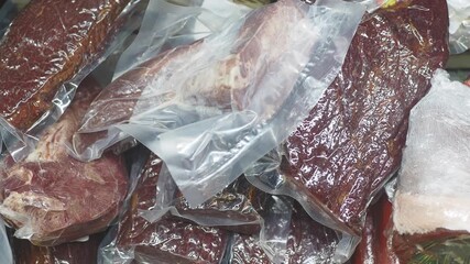 Fresh meats packaged in plastic at local market