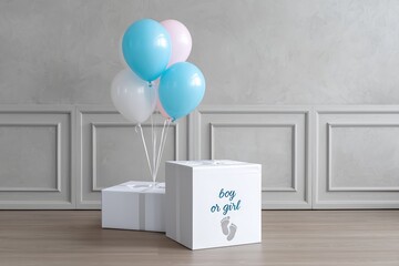 Gender reveal party box with blue and pink balloons. Baby shower celebration for determining the gender of the future child. Announcement of a new baby.