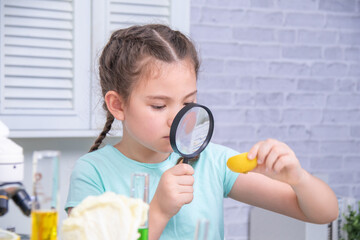 Science, education, school, experiment, Asian girl closely examining object with tweezers, simulating lab-based experiment in chemistry class, focused action in classroom, education, homeschool