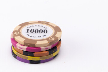 Stack of Las Vegas Poker Club Chips on White Background.