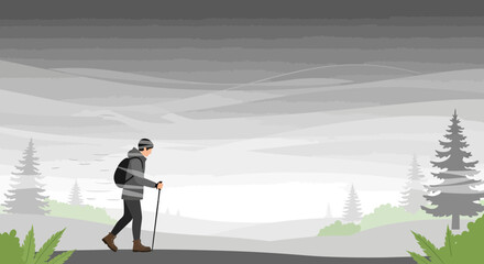 Obraz premium A Hiker Explores A Serene Mountain Vista Amidst A Misty And Overcast Environment
