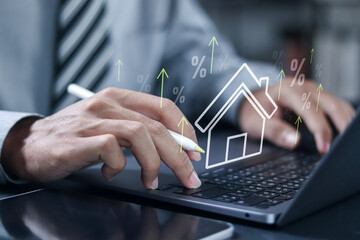 Real estate investment and financial growth concept. property management, real estate analysis, and profitable real estate investment strategies. Businessman use laptop with virtual icon.