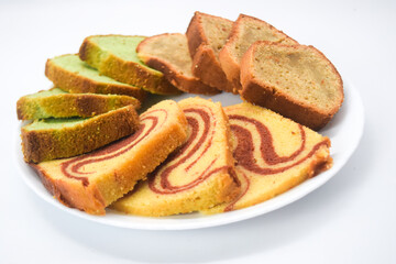 Sponge cake is a cake based on flour (usually wheat flour), sugar, butter and eggs, and is sometimes leavened with baking powder. It has a firm, yet well aerated structure, similar to a sea sponge. 

