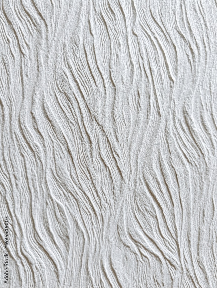 Aufkleber textured wall surface with flowing patterns creates a subtle and elegant atmosphere in a modern inte