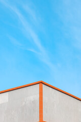 Fototapeta premium Modern Minimalist Architecture Exterior Building Corner with Clear Blue Sky Background