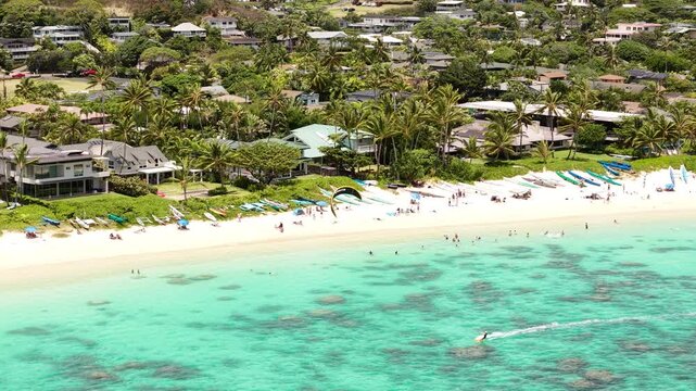 Kailua, Hawaii USA. Drone Shot of Lanikai Beach, Parasailing Parachute, People and Beachfront Properties