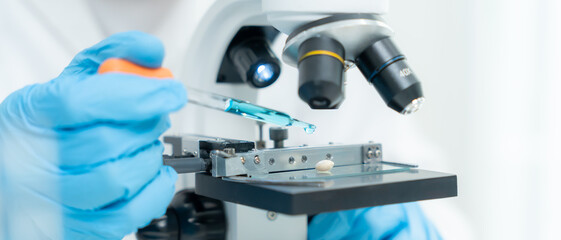 Scientist check chemical whole grains residues in laboratory. Control experts inspect the concentration of chemical residues. hazards, standard, prohibited substances, contaminate, Microbiologist