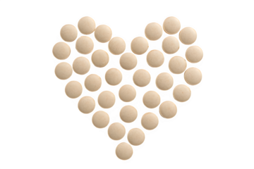 Heart-Shaped Arrangement of Tablets Isolated on Transparent Background