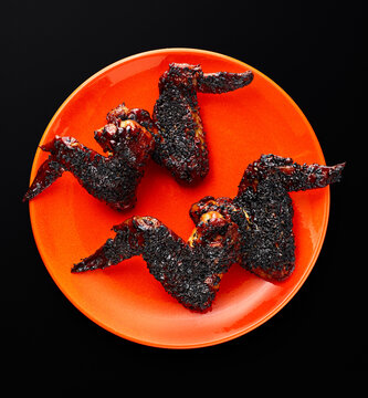 Charred Chicken Wings on Bright Plate