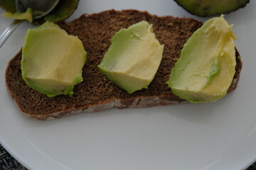 Avocado sandwich. Avocado sandwich made from ripe avocado spread on brown bread
