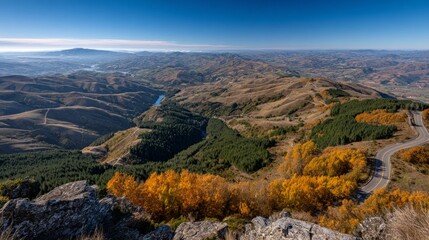Obraz premium A beautiful mountain view with a river running through it