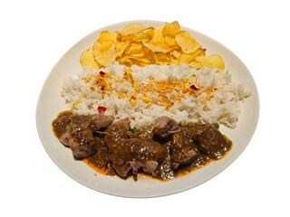 Hearty gourmet meal of braised liver in a rich brown sauce, served with white rice and crispy potato chips on a plate