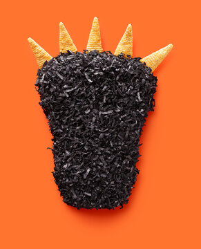 Halloween Werewolf Foot Treat on Orange Background