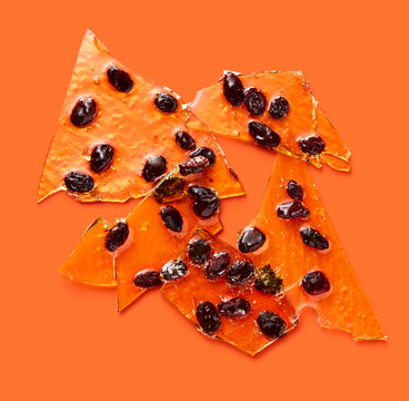 Petrified Orange Candy with Bugs (Raisins)
