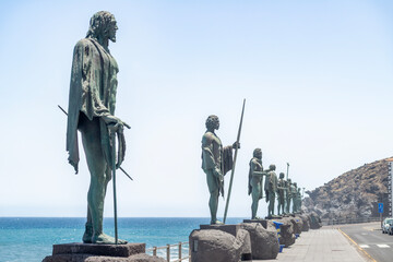 Fototapeta premium Statues of the Guanche Kings on the Candelaria Seafront, Tenerife Indigenous Menceyes Monuments by the Atlantic Ocean, Canary Islands