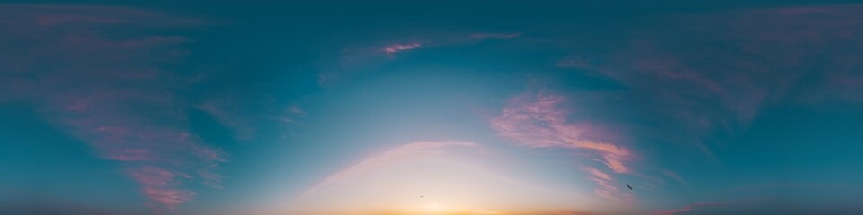 Sunset sky with bright glowing pink Cirrus clouds. Seamless spherical HDR 360 panorama. Full zenith or sky dome in 3D, sky replacement for aerial drone panoramas. Climate and weather change.