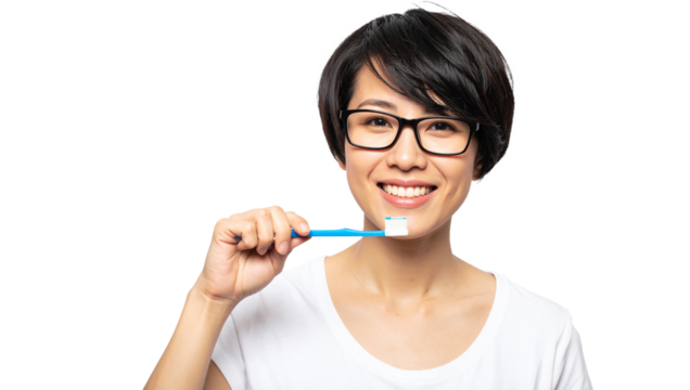 Brushing teeth daily routine home lifestyle image bright studio close-up view oral hygiene awareness