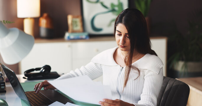 Woman, laptop and reading document at house for compliance, customer service and script. Agent, remote work and paperwork with pc for reference, account information and procedure manual for crm faq