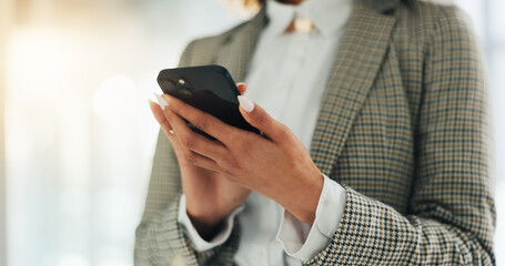 Phone, hands and businesswoman in office with networking, communication or connection online. Technology, contact and female corporate employee with cellphone for chatting on mobile app in workplace.