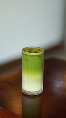 glass of green tea and milk