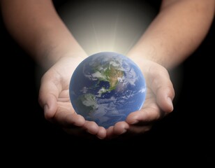 Hands Holding Glowing Earth with Light Rays