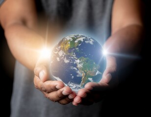 Human Hands Holding Glowing Earth with Light Rays