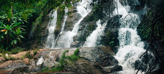 Waterfall landscape in natural forest, watershed and environment in tropical forest of Thailand