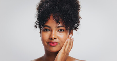 Touch, beauty and portrait of black woman in studio for dermatology, wellness and skin glow....