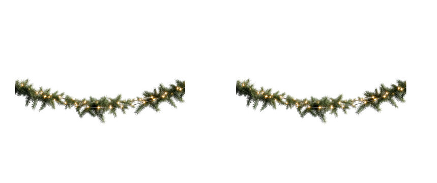 Festive evergreen garland with warm glowing fairy lights on transparent, cut out