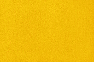 Obraz premium Yellow concrete cement wall texture for background and design.