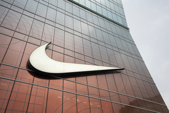 Beijing, China - July 21, 2023: Nike logo is seen at the company's flagship store at Wangfujing in Beijing, China. Nike, Inc. is an American athletic footwear and apparel company.