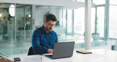 Laptop, typing and glasses with business man in office for research, payroll manager and audit report. Planning, budget review and accounting firm with person in agency for tax benefit and email
