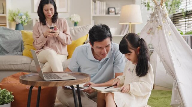 Dad, Mom, and daughter enjoy a moment of joyful homework on the sofa, a peaceful scene of family togetherness at home. They embrace a cheerful lifestyle, making study an exciting part of life	