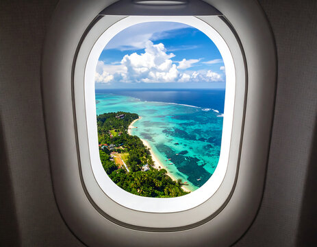Fototapeta Aerial view of tropical islands seen through an airplane window.