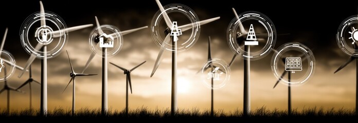 Wind turbines with glowing interface elements at sunset