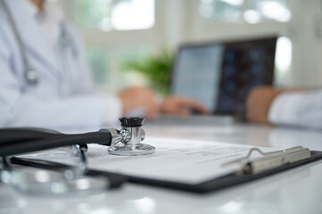medical concept. stethoscope and medical data reports with research doctors team meeting. .